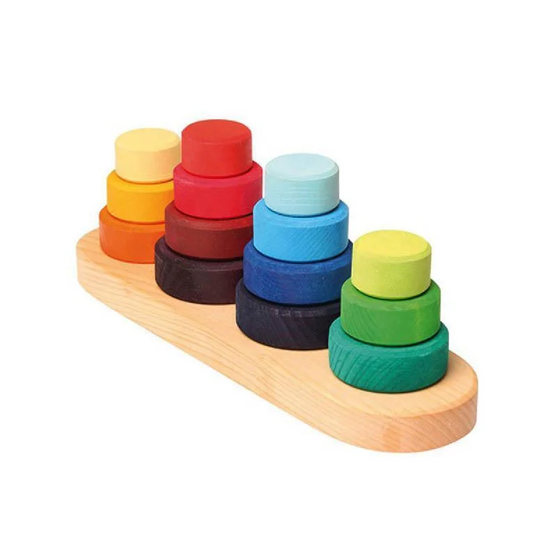 Hand - Turned Wooden Spinning Top with a Colorful Design for Classic AmusementGrimm's fabuto stacking towers Hand - Turned Wooden Spinning Top with a Colorful Design for Classic AmusementGrimm's fabuto stacking towers