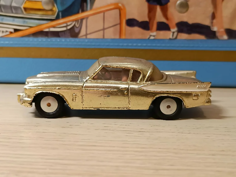 1:18 Scale Die - Cast Model of a 1969 Chevrolet Camaro SS with Opening Doors and Hood211S Studebaker Golden Hawk in silver-gold plate finish 1 1:18 Scale Die - Cast Model of a 1969 Chevrolet Camaro SS with Opening Doors and Hood211S Studebaker Golden Hawk in silver-gold plate finish 1