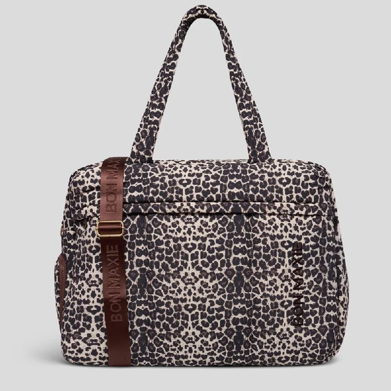 Stylish Leather - Trimmed Canvas Duffel Bag in Beige for the Fashion - Conscious TravelerLarge Weekender Nylon Duffel Bag -- Leopard