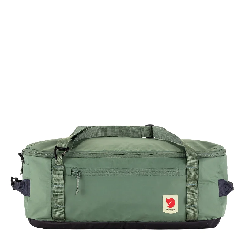 Waterproof Duffel Bag with Reflective Stripes in Yellow for Nighttime HikingFjallraven High Coast Duffel 22L Patina Green